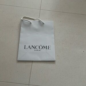 Lancôme Paris paper bag.